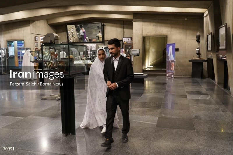 Marriage ceremony of 14 Turkmen couples in Tehran