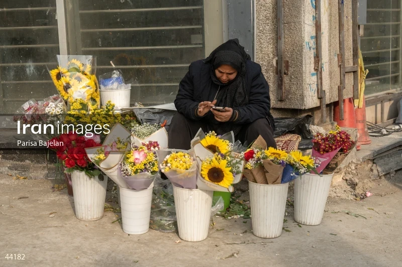 Female Flower Vendor in Tehran
