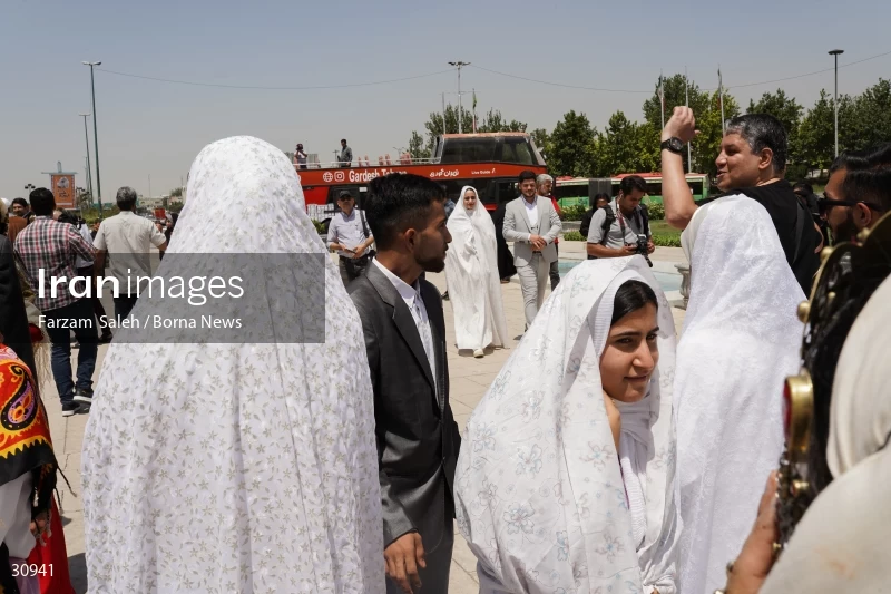 Marriage ceremony of 14 Turkmen couples in Tehran