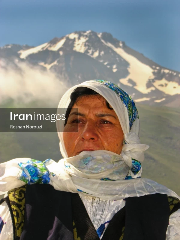 Shahsavan Nomadic woman in front of Sabalan