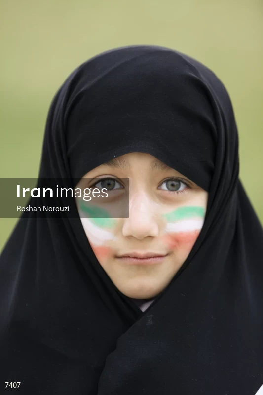Iranian girl has iran flag on her face