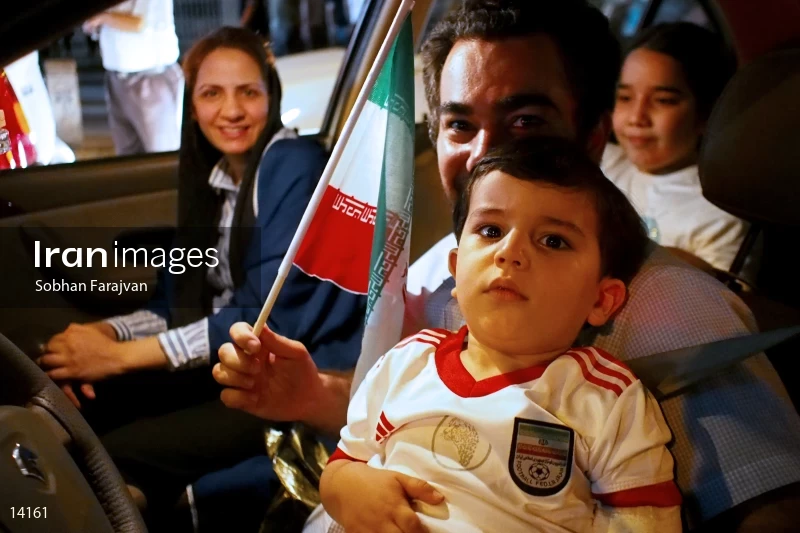 Iranian fans celebrate victory against Morocco
