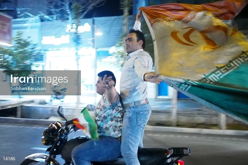 Iranian fans celebrate victory against Morocco