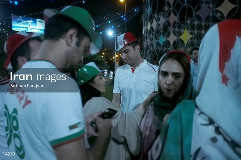 Iranian fans celebrate victory against Morocco