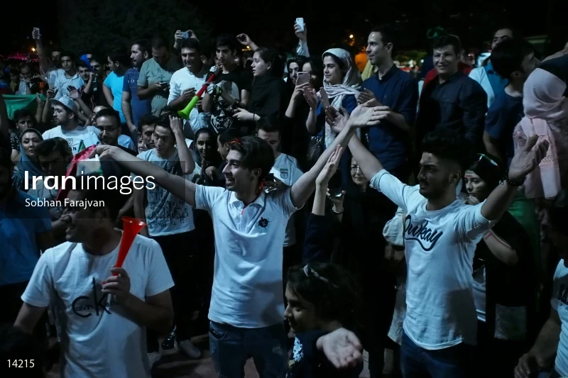 Iranian fans celebrate victory against Morocco