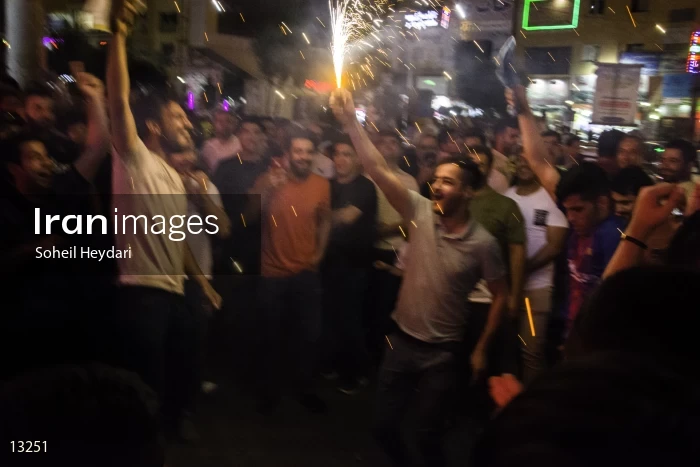 Celebration of the Iranian people after winning the Iranian soccer team against Morocco