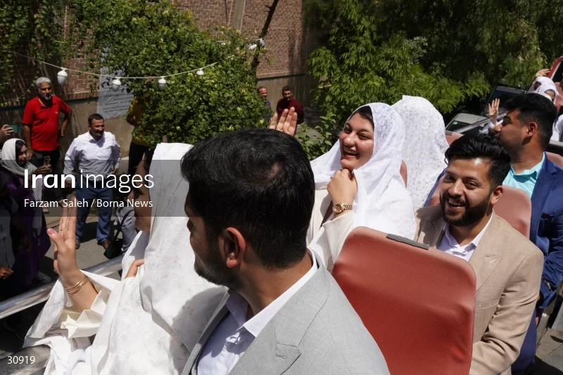 Marriage ceremony of 14 Turkmen couples in Tehran