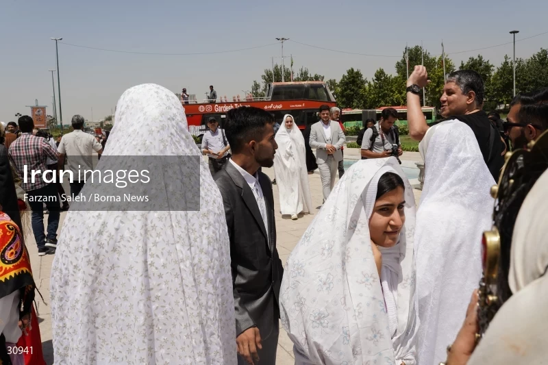Marriage ceremony of 14 Turkmen couples in Tehran