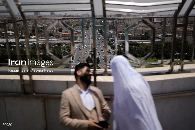 Marriage ceremony of 14 Turkmen couples in Tehran