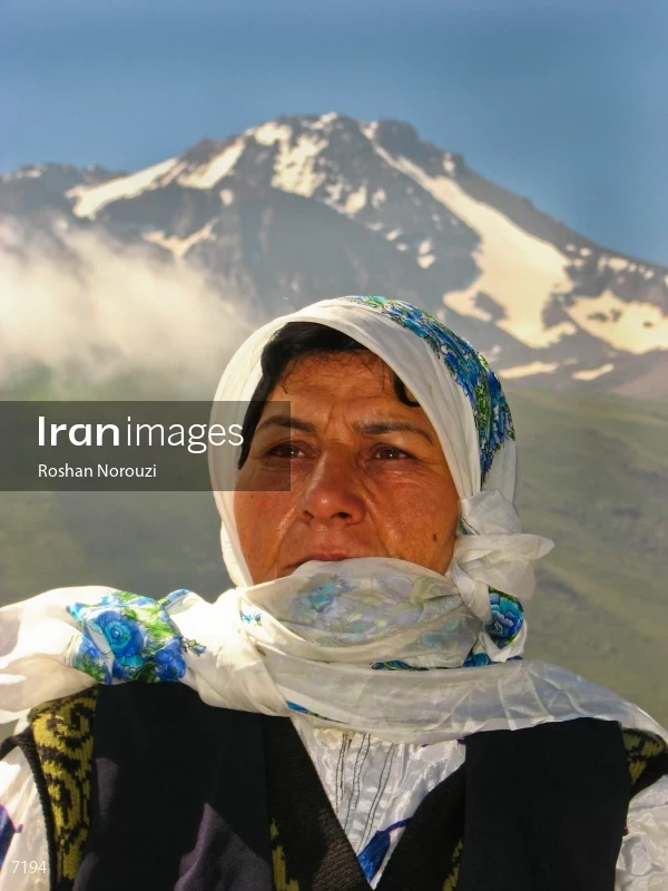 Shahsavan Nomadic woman in front of Sabalan