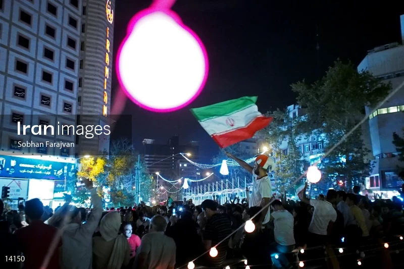 Iranian fans celebrate victory against Morocco