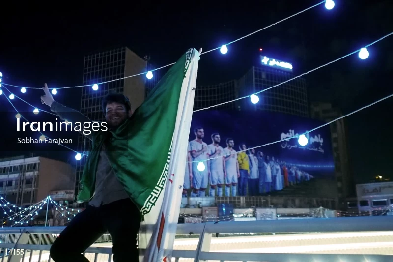 Iranian fans celebrate victory against Morocco