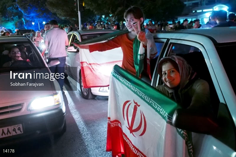 Iranian fans celebrate victory against Morocco